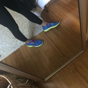 Blue nike athletic shoes